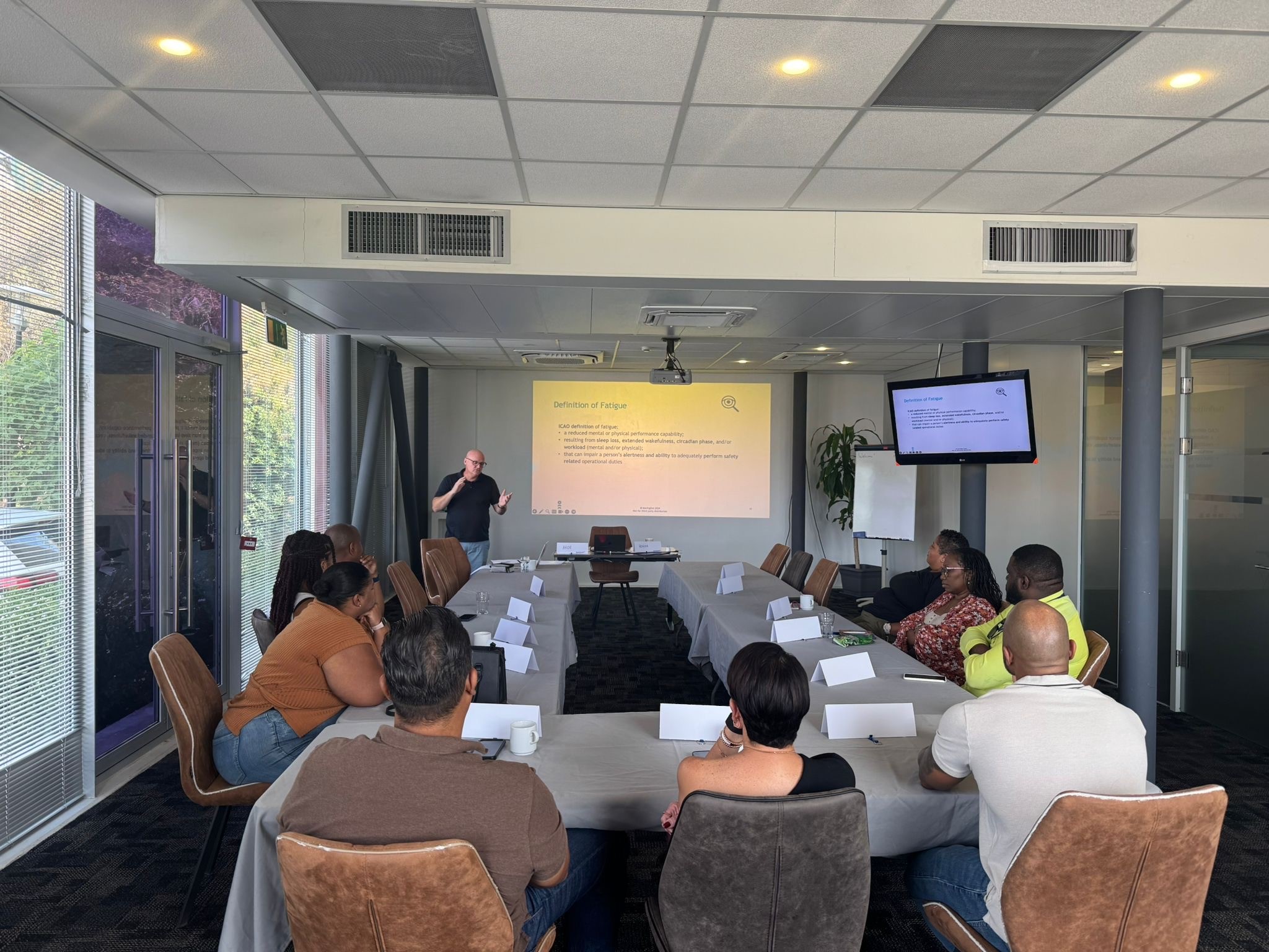 Aviation professionals participating in a fatigue risk management workshop focused on ATM safety and human performance.